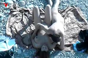 Big tits amateur wife gives a public beach blowjob
