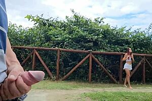 Risky street handjob caught by redhead beauty