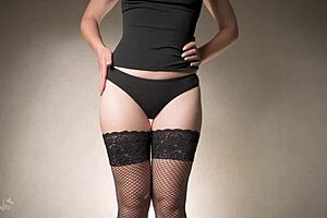 Sensual Thigh Gap Tease in Lingerie and Fishnets