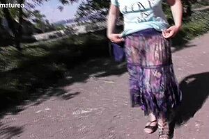 Amateur hairy mature in transparent dress shows her fat ass and shaven twat