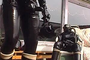 2003roxinaretrorubberoxshinyhorny150403xxl wmv showcases retro rubber fun