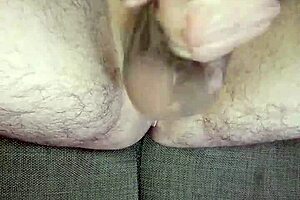 Solo pleasure with an uncut cock