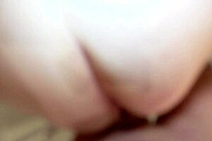 Submissive Anastasia gets oral sex while urinating in a bathroom scene