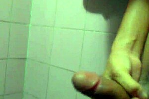 The young guy jerks off solo in his room.