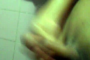 The young guy jerks off solo in his room.