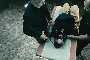 insane woman is kept in a cell and only brought out for use of her pussy