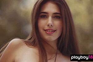 Petite teen Katrine Pirs strips and poses naked in outdoor pool