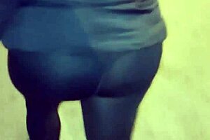 Crossdressing mature prostitute flaunts her assets outdoors publicly