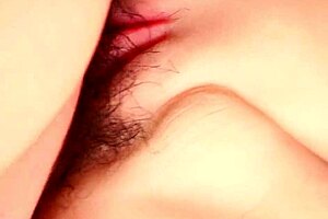 experience the slickness of a gorgeous woman's shaved close-up vagina