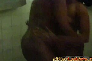 Black lesbians Nelly and Natasha have fun in the bathroom