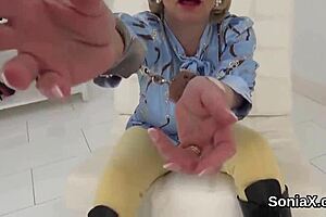 Unfaithful British milf Lady Sonia reveals her massive balloons with tight allure.