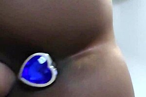 Mature Latina Uses Dildo on Back in Bed