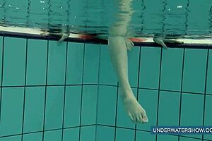 katya okuneva in red dress at the pool