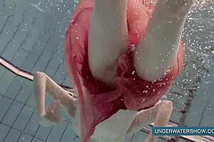 katya okuneva in red dress at the pool