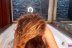 Big tits blonde gets fucked in a hot tub