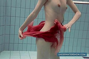 katya okuneva in red dress at the pool