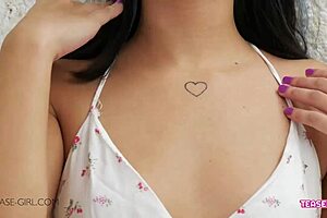 A brunette teen shows off her perfect body in a video