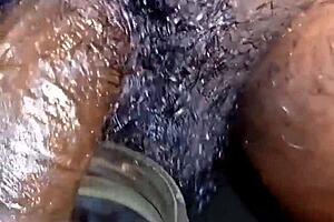 A beautiful shemale with a micro cock pisses in different locations