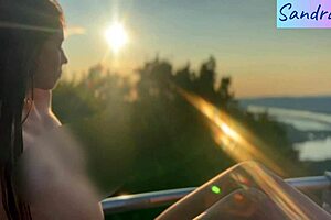 Oh, nipple play in paradise with that pretty brunette!