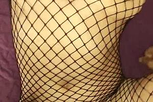 A cute couple experiments with porn in lingerie and stockings.