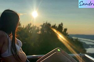 Oh, nipple play in paradise with that pretty brunette!