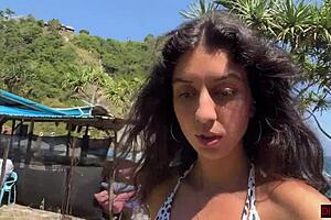 Hottie sucks dick on beach