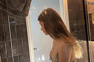 Ever seen a petite brunette cheerleader strip her panties in the bathroom?