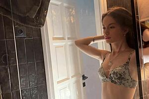 Ever seen a petite brunette cheerleader strip her panties in the bathroom?