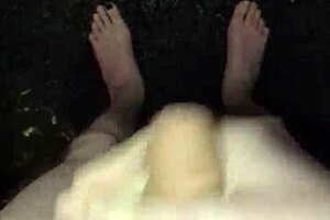 I'm stroking my big cock naked in the rain outdoors