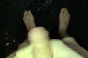 I'm stroking my big cock naked in the rain outdoors