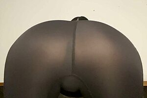 Yoga in sports pants with a rope, a naughty tease
