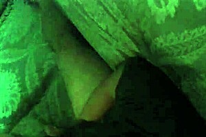 A wife secretly performs a blowjob on her husband using a hidden camera.