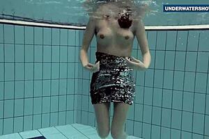 Girls in diving suits with fake big tits, flashing their friends