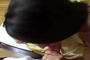 The brunette slut is fucking her boy on the bed with a blowjob.