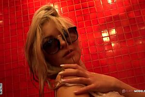 Young Blond Girl Teases In Shower