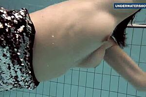 Girls in diving suits with fake big tits, flashing their friends