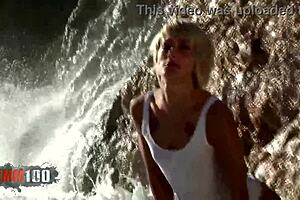 blonde nicky wayne strips by the sea, revealing her petite body