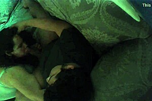 A wife secretly performs a blowjob on her husband using a hidden camera.