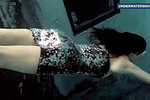 Girls in diving suits with fake big tits, flashing their friends
