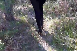 High heels and big ass in forest pantyhose walk