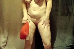 Slave F Performs Striptease in Outdoor Bondage