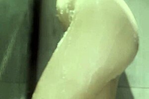 Girlfriend Plays With Shaved Pussy In Shower