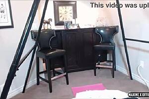 At home, brunette beauty plays with toys on webcam