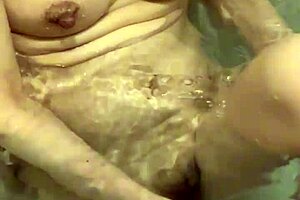 Today my wife washed her body slowly in the bath before sex. I wanted to touch her nipples and got excited.