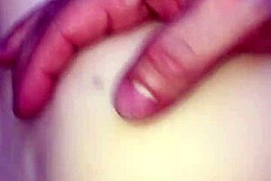 Enjoying the features of a sex toy doll.