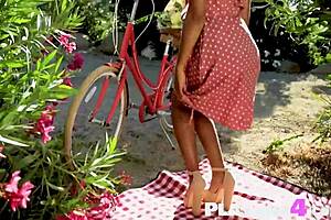 Curly black teen Jenna Foxx poses seductively with big tits at picnic