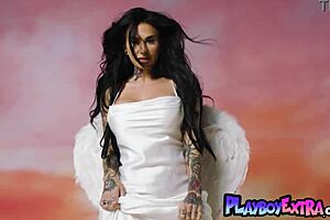 Joanna Angel strips, revealing sexy tattoos and big tits