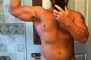 Muscular Man Flexes Big Dick and Cums on Mirror