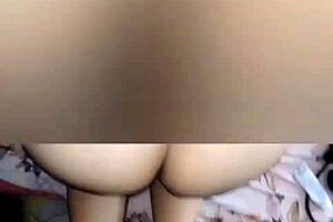 Young woman moaning pleasurably on all fours