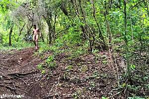 Exhibitionist in the forest teases with big tits for fans